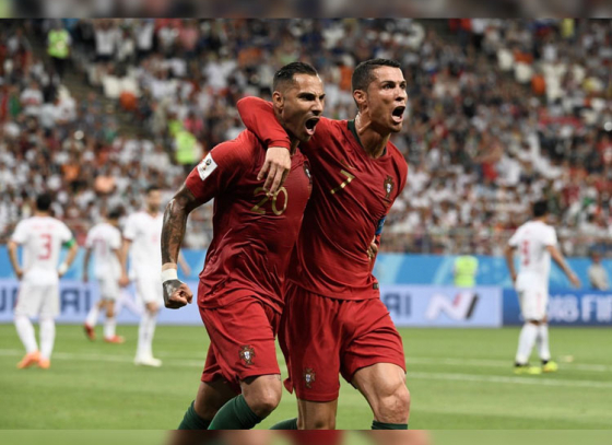 Portugal hang on to a 1-1 draw despite referee farce and progress to the round of 16