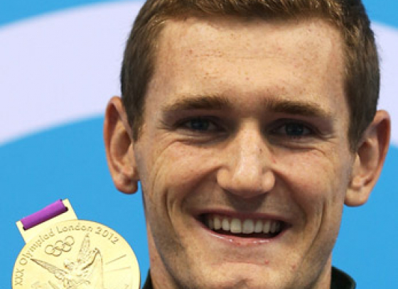 Gold-medal swimmer admits to cheating in 100 breaststroke