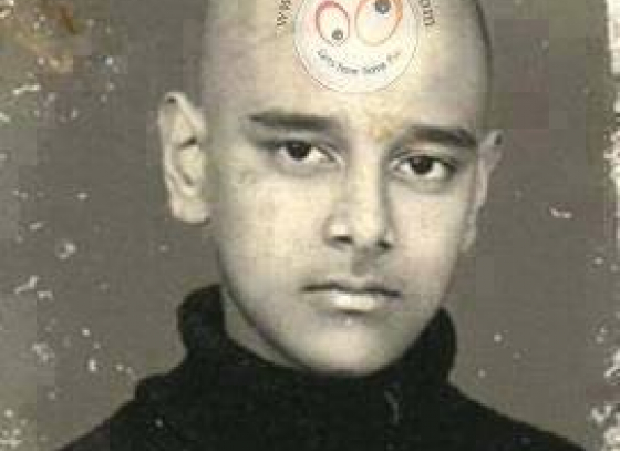 Identify Cricketer from his childhood photo ?
