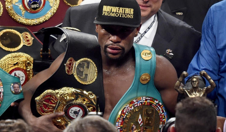 Boxer Mayweather beats Pacquiao, remains undefeated