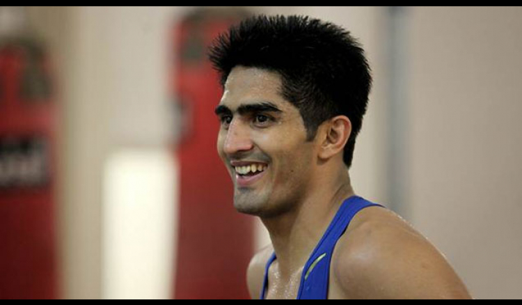 Boxer Vijender heads to London for next fight